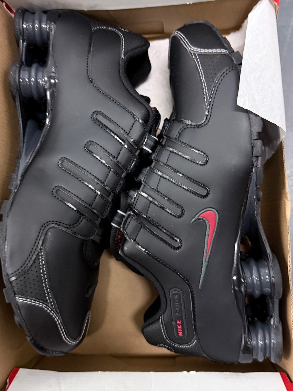 Nike Black Sneakers with Red Swoosh